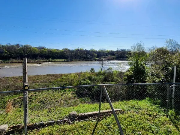 a view of a lake from a balcony
