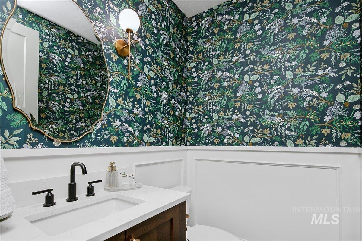 1911 East Mainacht Street Meridian, ID 83642 - Photo 32 of 49 Half bathroom featuring vanity and toilet