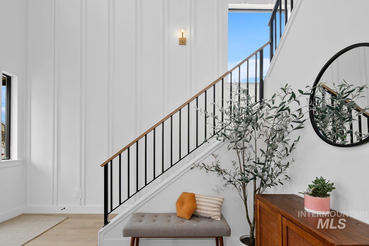 1911 East Mainacht Street Meridian, ID 83642 - Photo 6 of 49 Stairs featuring healthy amount of natural light and wood finished floors