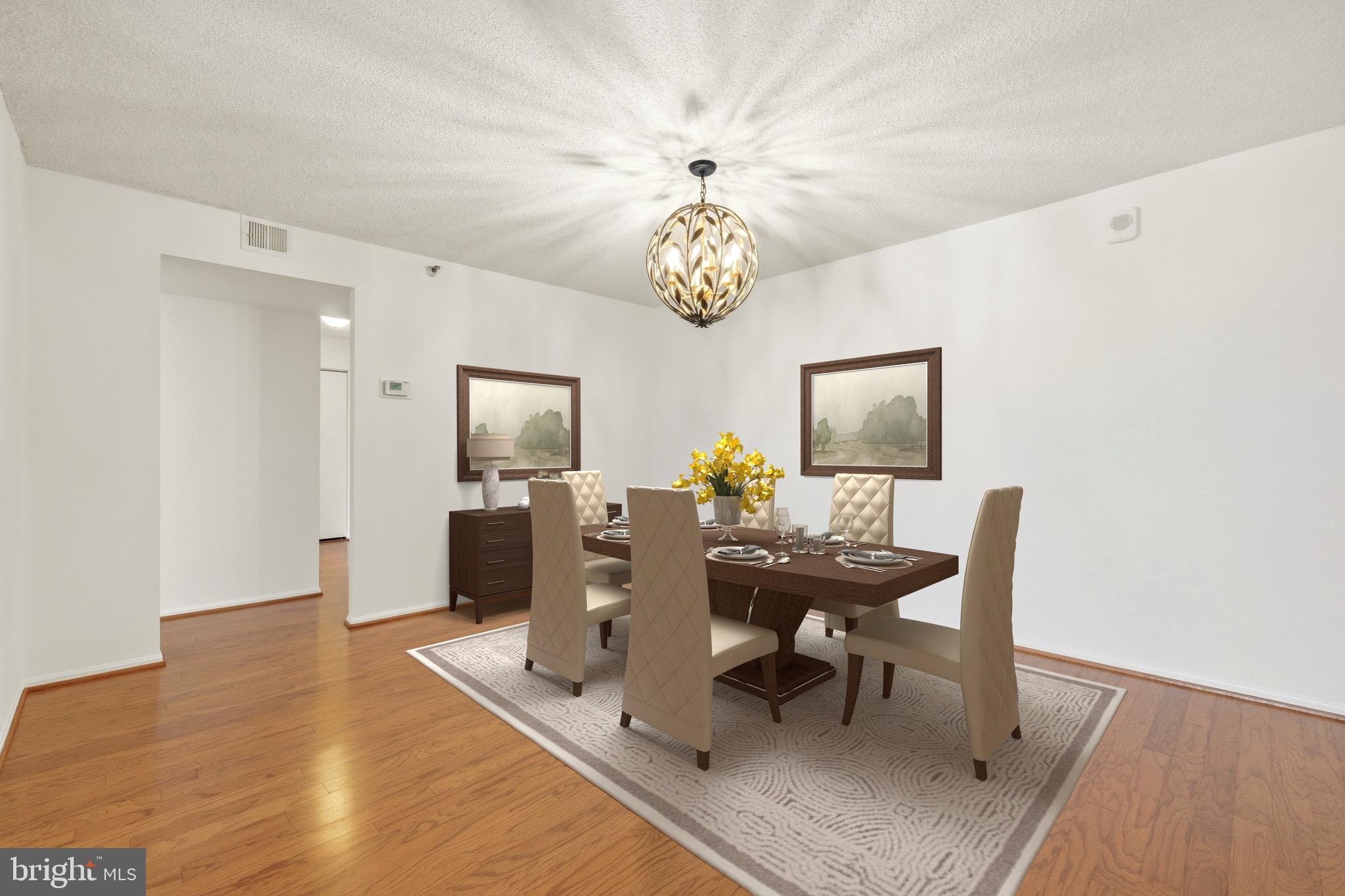 15107 Interlachen Drive, Unit 2801 Silver Spring, MD 20906 - Photo 12 of 50 a view of a dining room with furniture and wooden floor