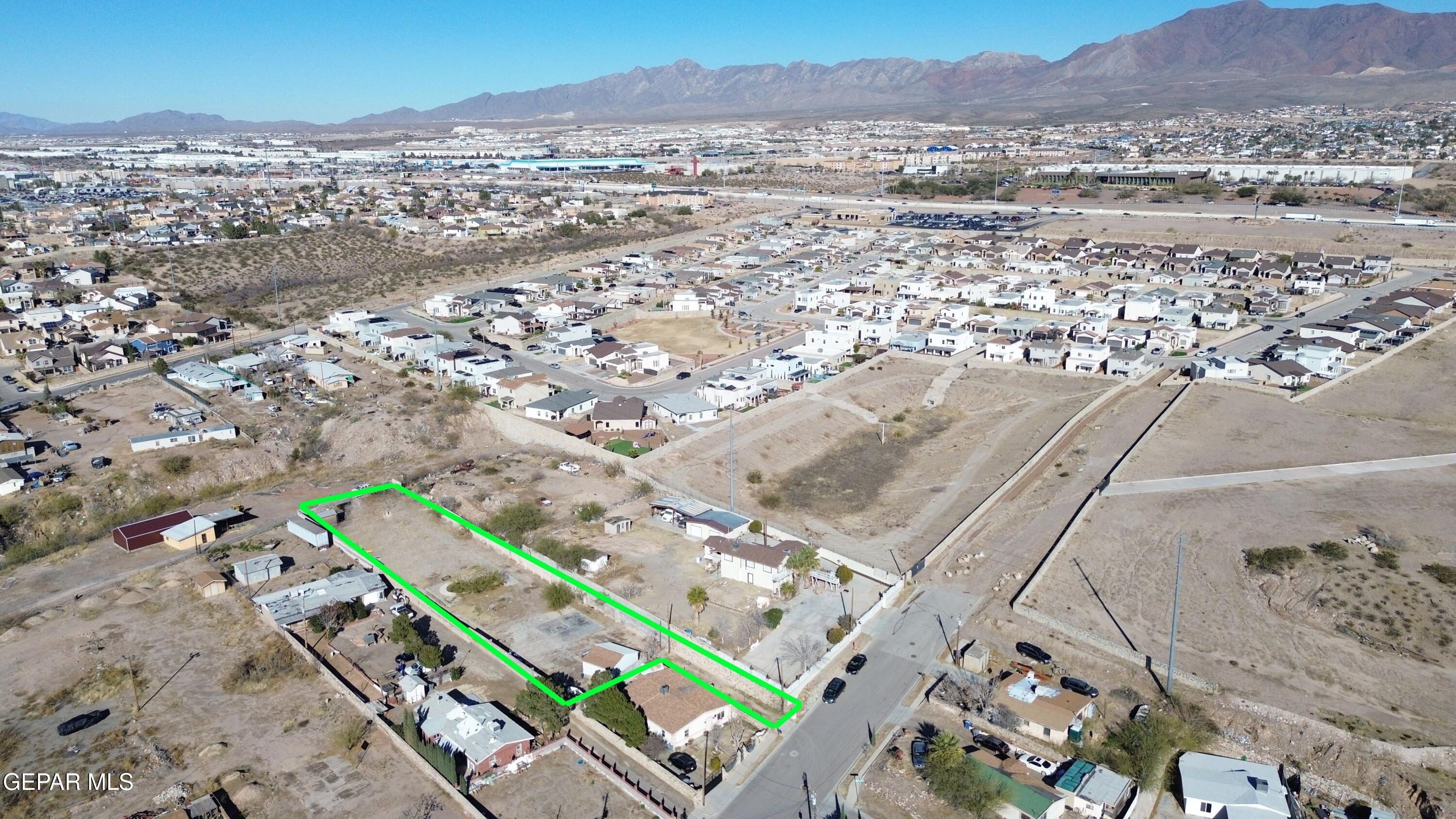 325 Edgar Road El Paso, TX 79932 - Photo 1 of 15 an aerial view of residential houses with outdoor space