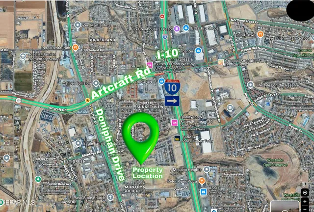 an aerial view of a building with outdoor space