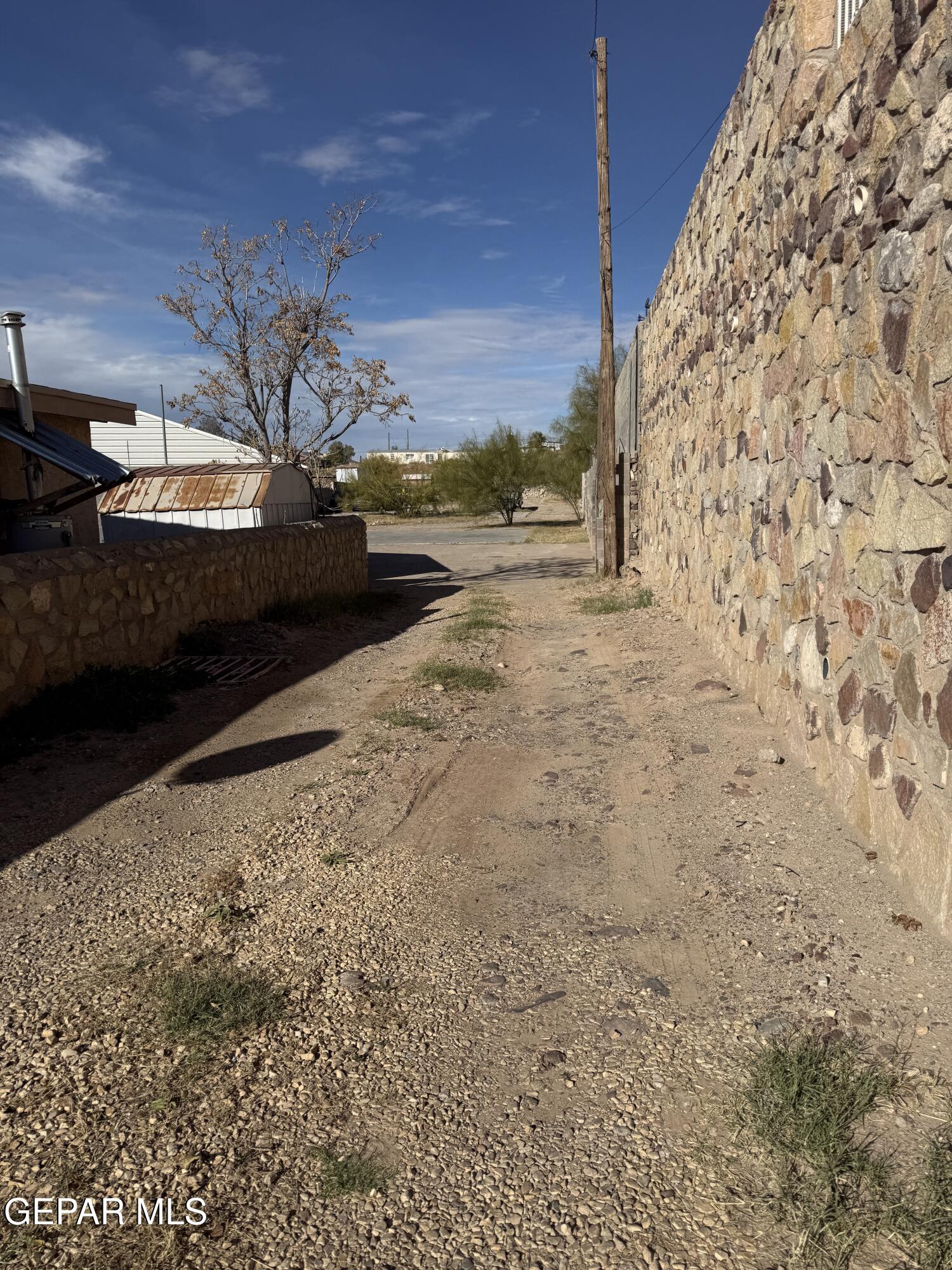 325 Edgar Road El Paso, TX 79932 - Photo 5 of 15 a view of a backyard of the house