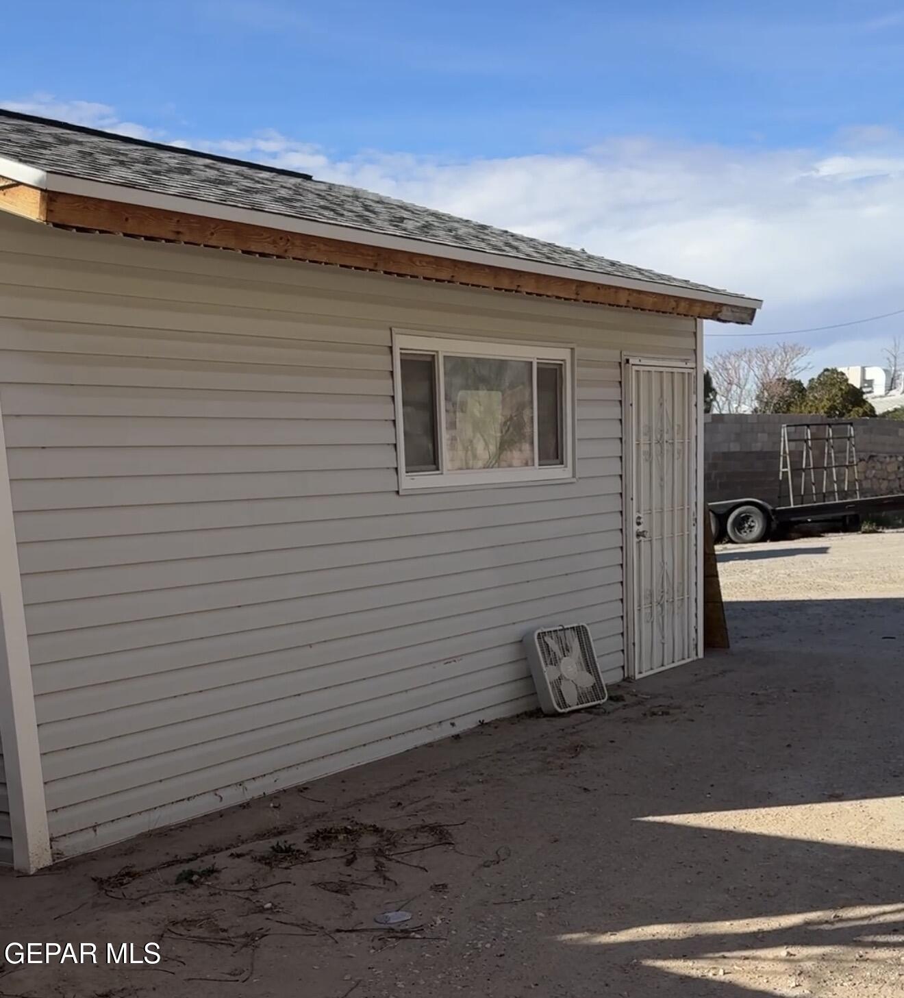325 Edgar Road El Paso, TX 79932 - Photo 7 of 15 a view of a house with a yard