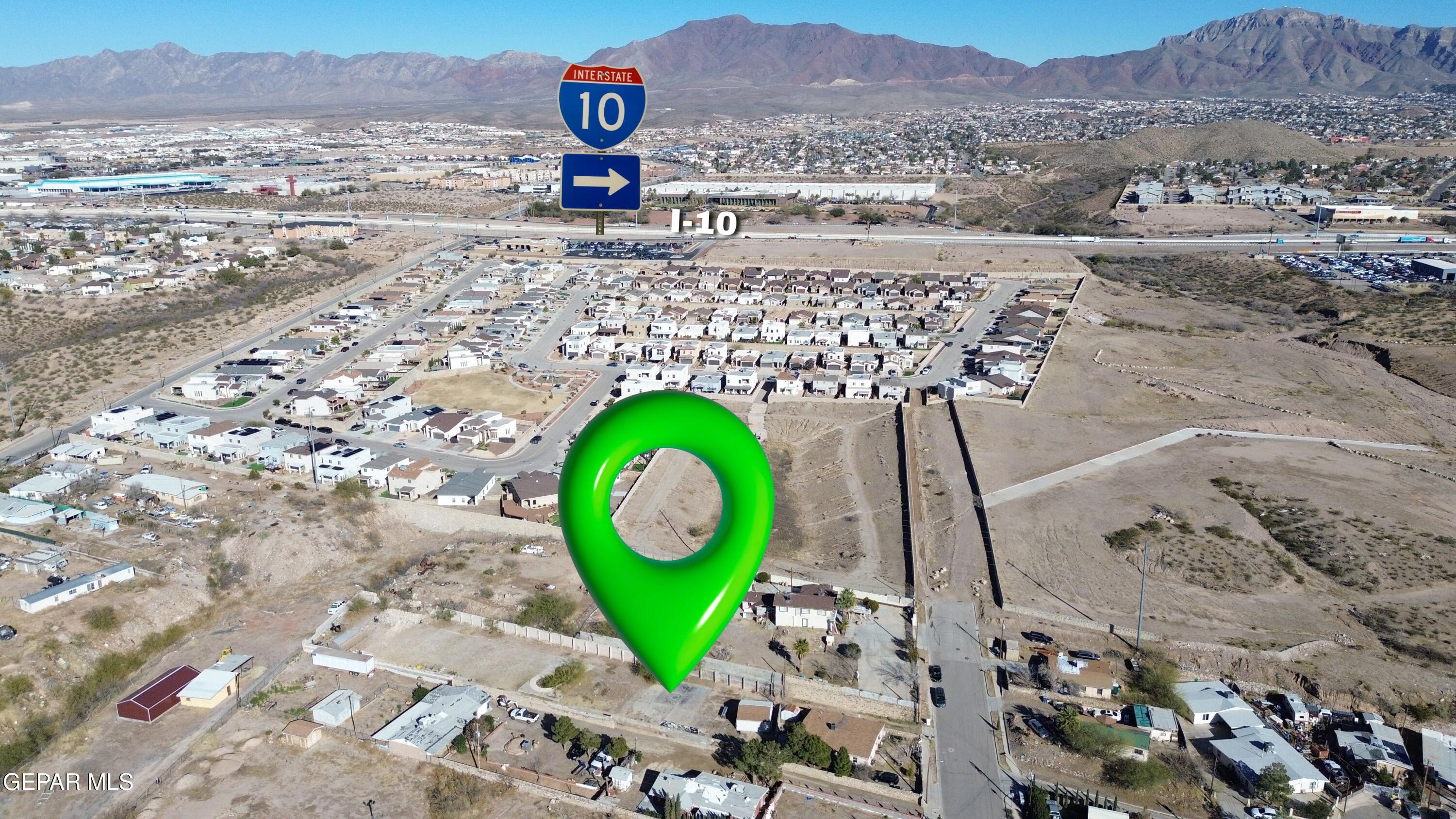 325 Edgar Road El Paso, TX 79932 - Photo 9 of 15 a view of a street with a building in the background