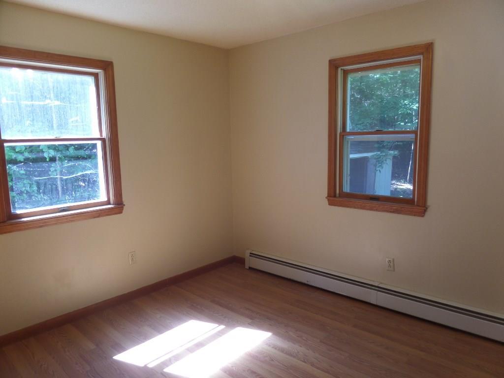 47 Bryer Heights Road Milford, ME 04461 - Photo 12 of 24 1st floor bedroom
