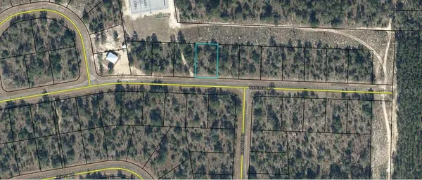 a view of a swimming pool with a outdoor seating