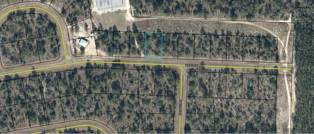 a view of a swimming pool with a outdoor seating