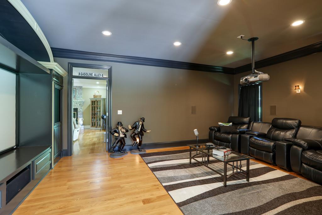 1100 Allen Road Murfreesboro, TN 37129 - Photo 11 of 30 a living room with furniture a rug and a chandelier