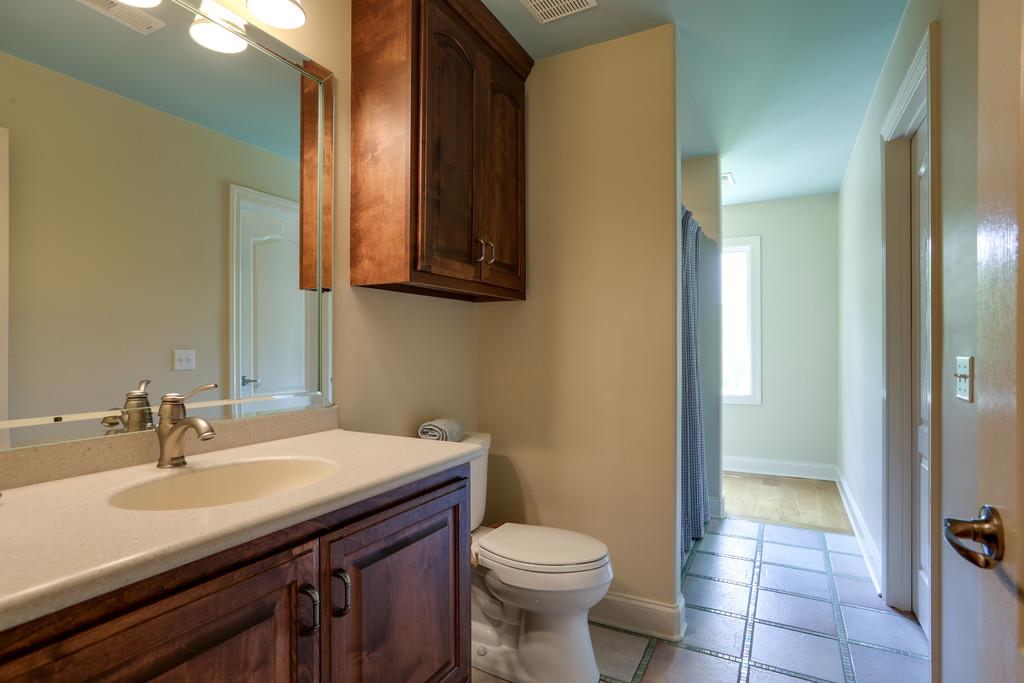 1100 Allen Road Murfreesboro, TN 37129 - Photo 23 of 30 a bathroom with a sink and a mirror