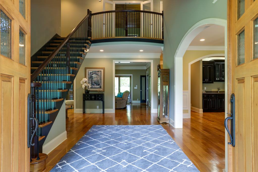 1100 Allen Road Murfreesboro, TN 37129 - Photo 3 of 30 a view of a hallway with wooden floor and staircase