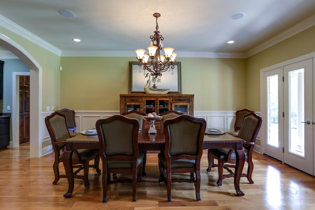 1100 Allen Road Murfreesboro, TN 37129 - Photo 6 of 30 a view of a dining room with furniture and wooden floor