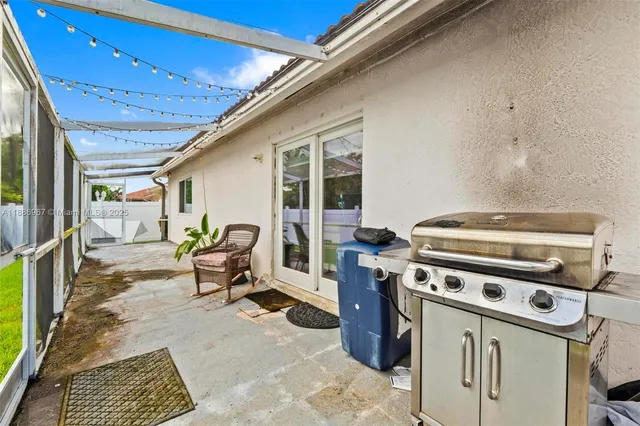 a kitchen with a stove and a refrigerator