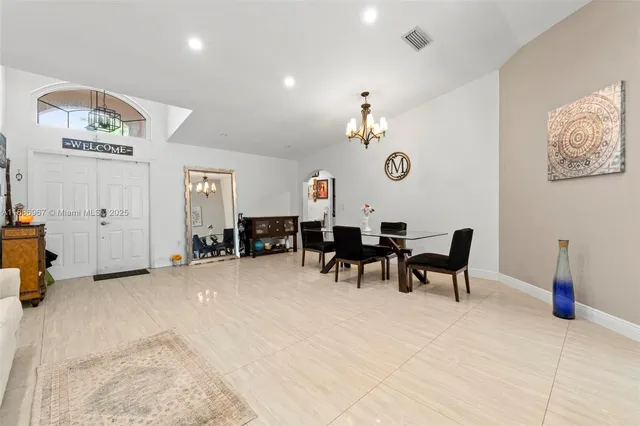 a view of a dining room with furniture