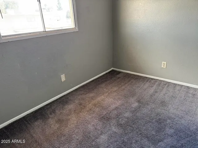 an empty room with closet