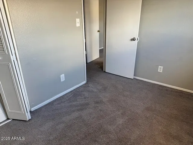 a view of hallway with shower