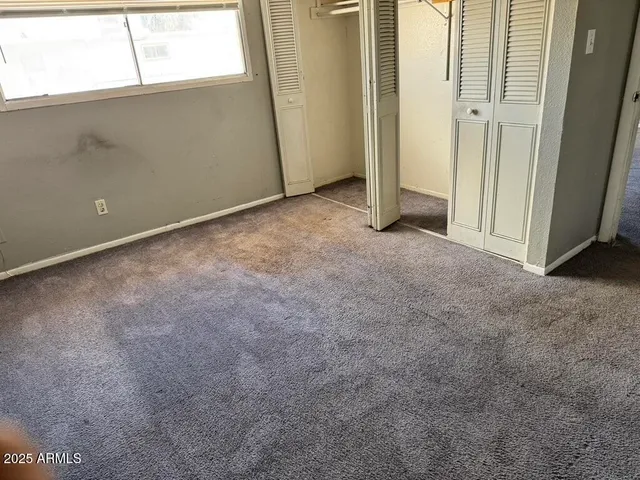 a bathroom with a sink a toilet a tub and shower