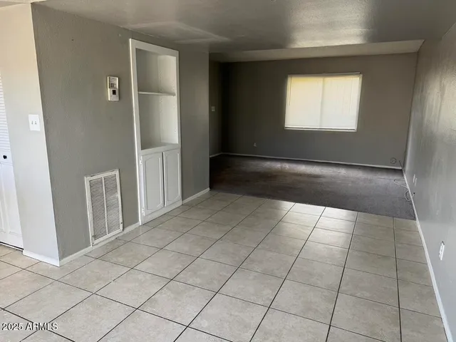 an empty room with windows