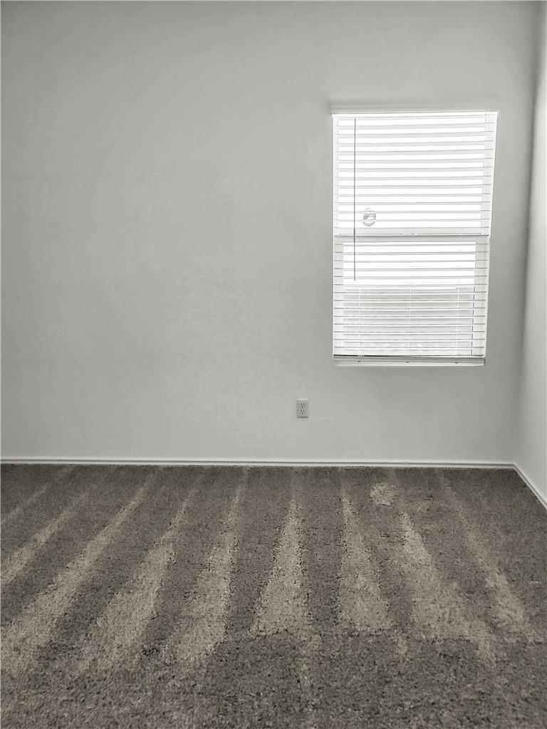 251 Geode Glen Maxwell, TX 78656 - Photo 9 of 16 an empty room with a window