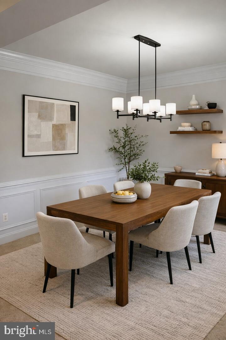 6872 Witton Circle Gainesville, VA 20155 - Photo 15 of 22 a view of a dining room with furniture