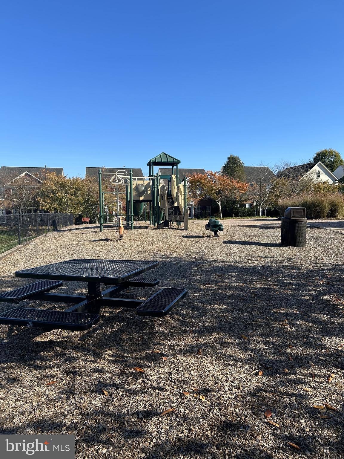 6872 Witton Circle Gainesville, VA 20155 - Photo 19 of 22 a view of a street with a building in the background