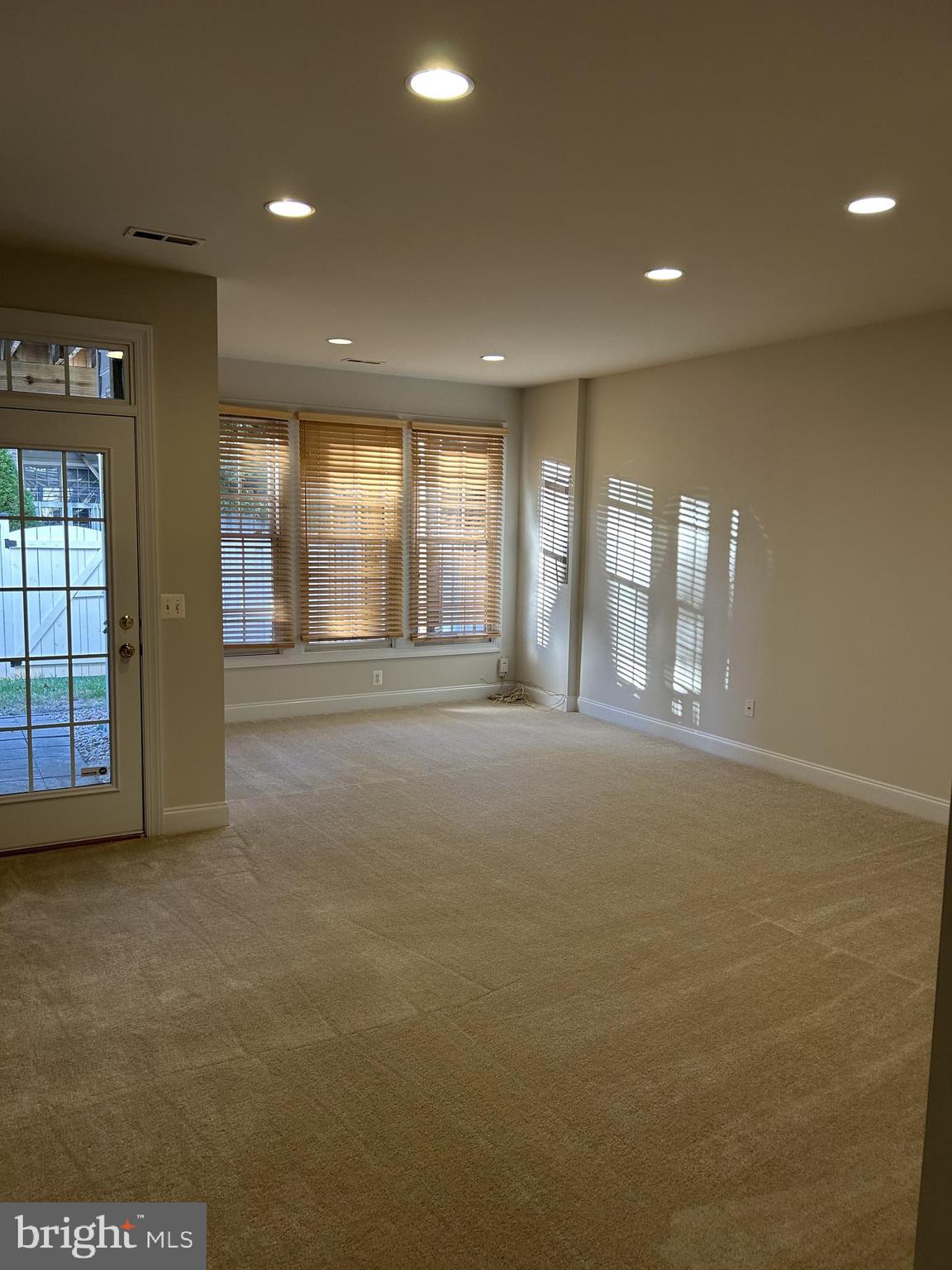 6872 Witton Circle Gainesville, VA 20155 - Photo 3 of 22 a view of an empty room with a window