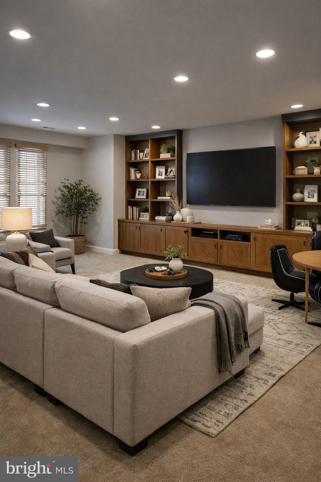 6872 Witton Circle Gainesville, VA 20155 - Photo 4 of 22 a living room with furniture and a flat screen tv
