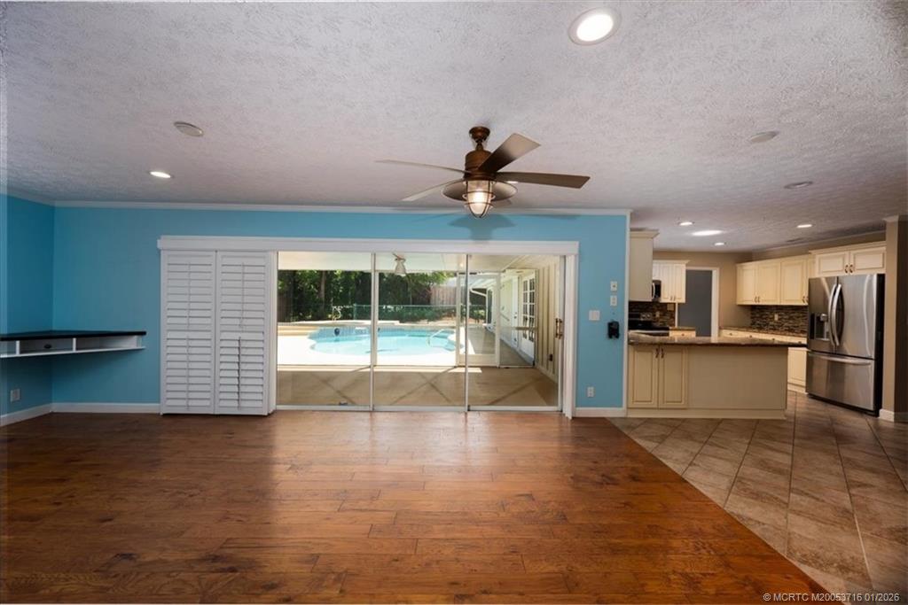 511 Krueger Parkway Stuart, FL 34996 - Photo 19 of 56 a view of large kitchen with a sink and a large window