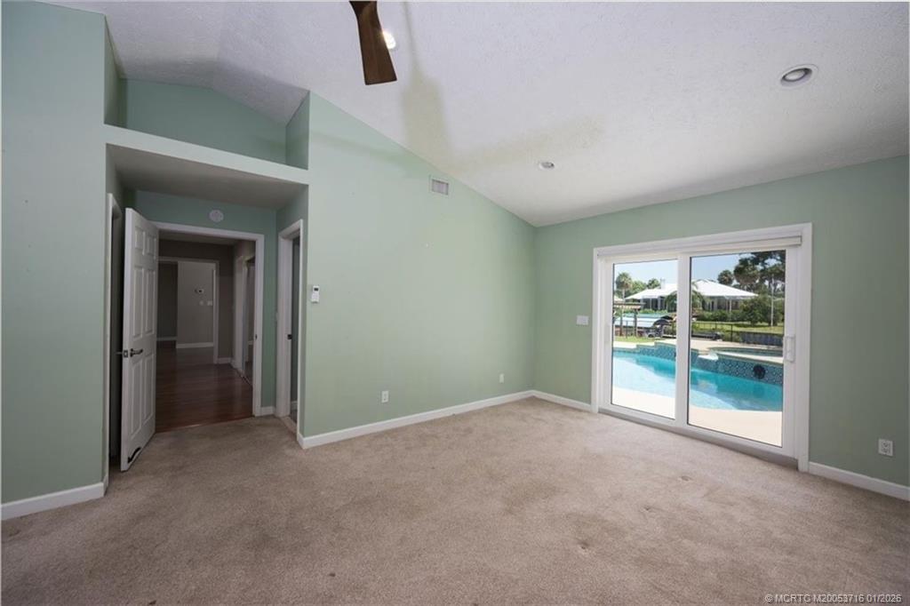 511 Krueger Parkway Stuart, FL 34996 - Photo 23 of 56 a view of an empty room with a window