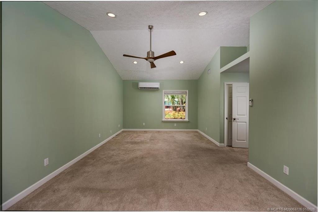511 Krueger Parkway Stuart, FL 34996 - Photo 24 of 56 a view of a livingroom with a ceiling fan and window