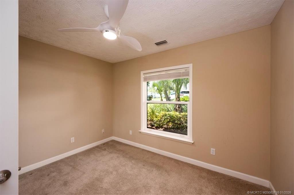 511 Krueger Parkway Stuart, FL 34996 - Photo 32 of 56 an empty room with a window