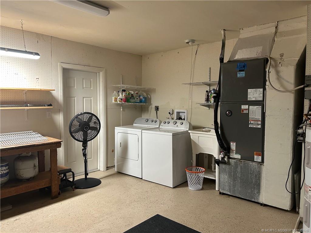 511 Krueger Parkway Stuart, FL 34996 - Photo 55 of 56 a room with storage and utility