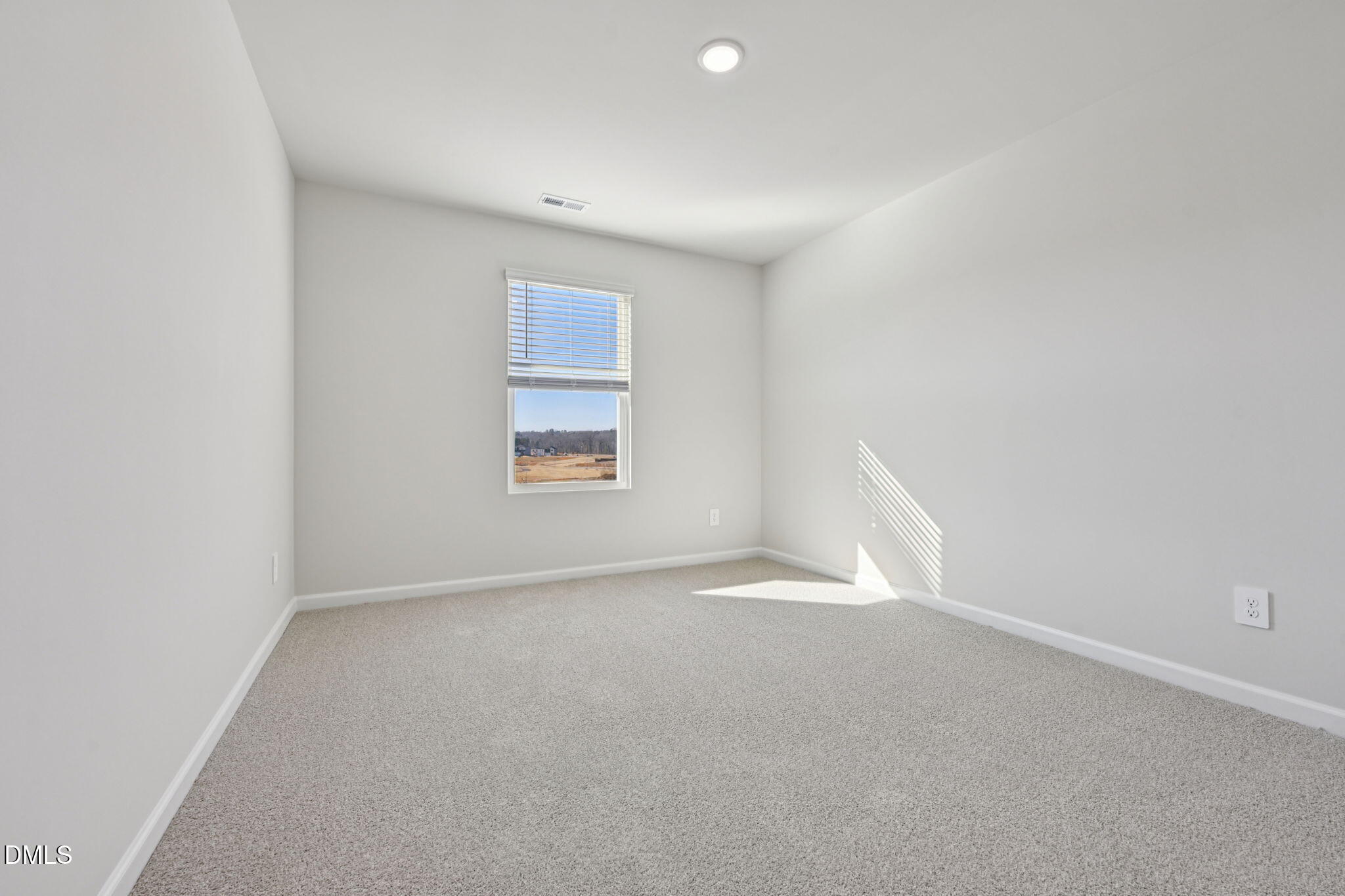 2145 Topsail Road Durham, NC 27703 - Photo 28 of 49 an empty room with a window