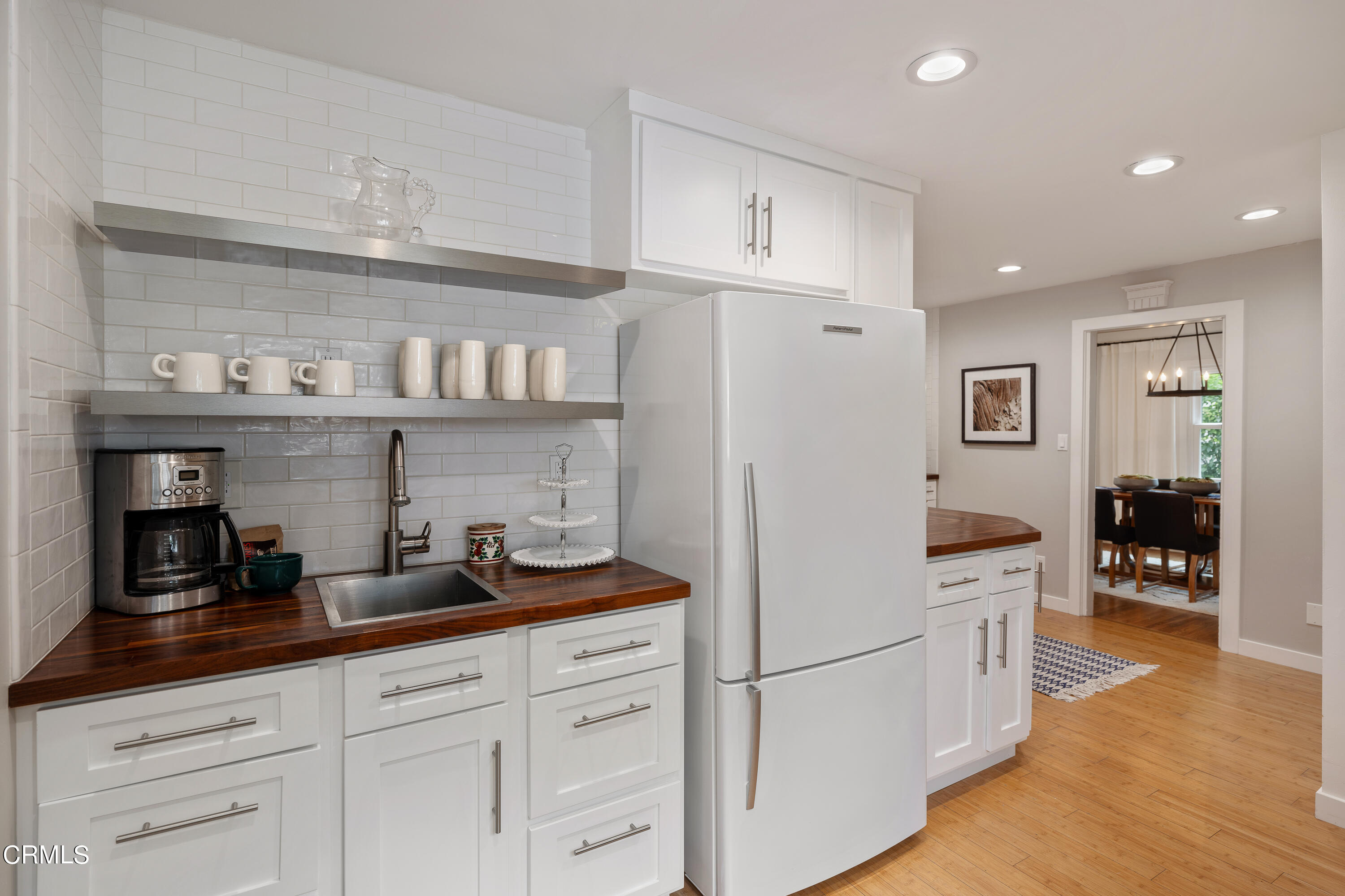 488 Colman Street Altadena, CA 91001 - Photo 23 of 75 a kitchen with granite countertop cabinets and wooden floor