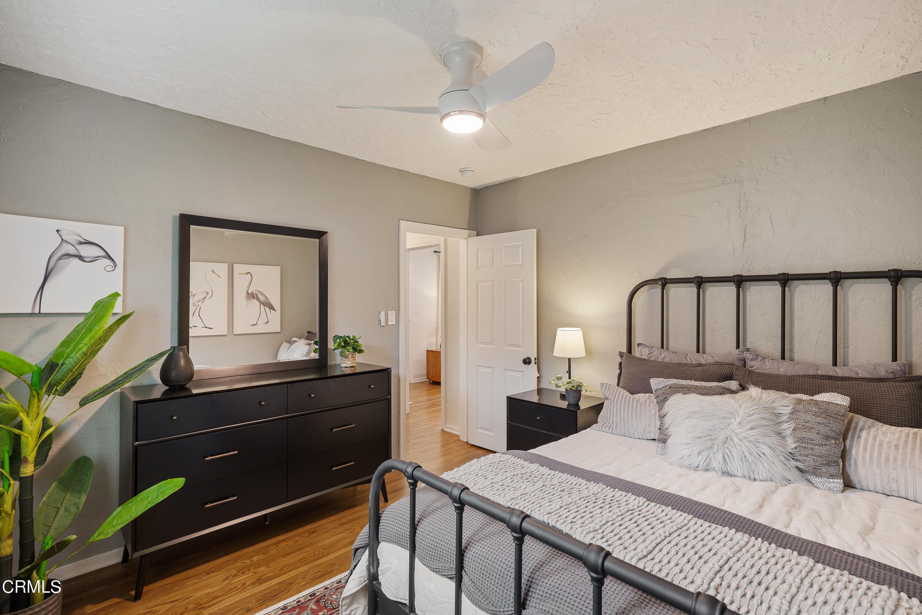 488 Colman Street Altadena, CA 91001 - Photo 27 of 75 a bedroom with a bed and a dresser