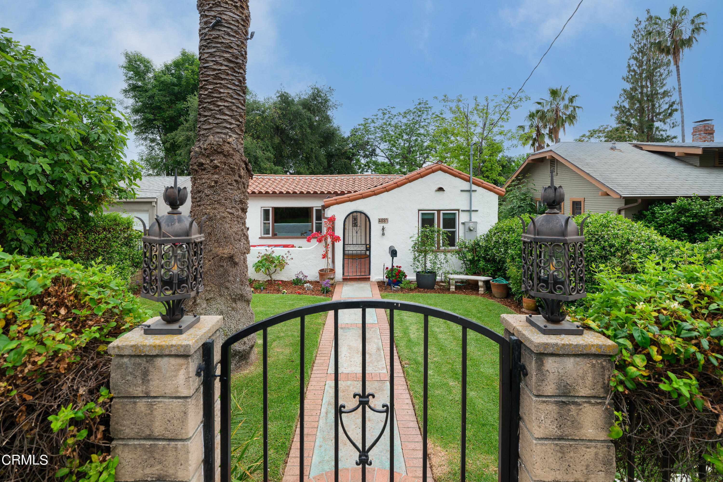 488 Colman Street Altadena, CA 91001 - Photo 3 of 75 a front view of a house with a garden
