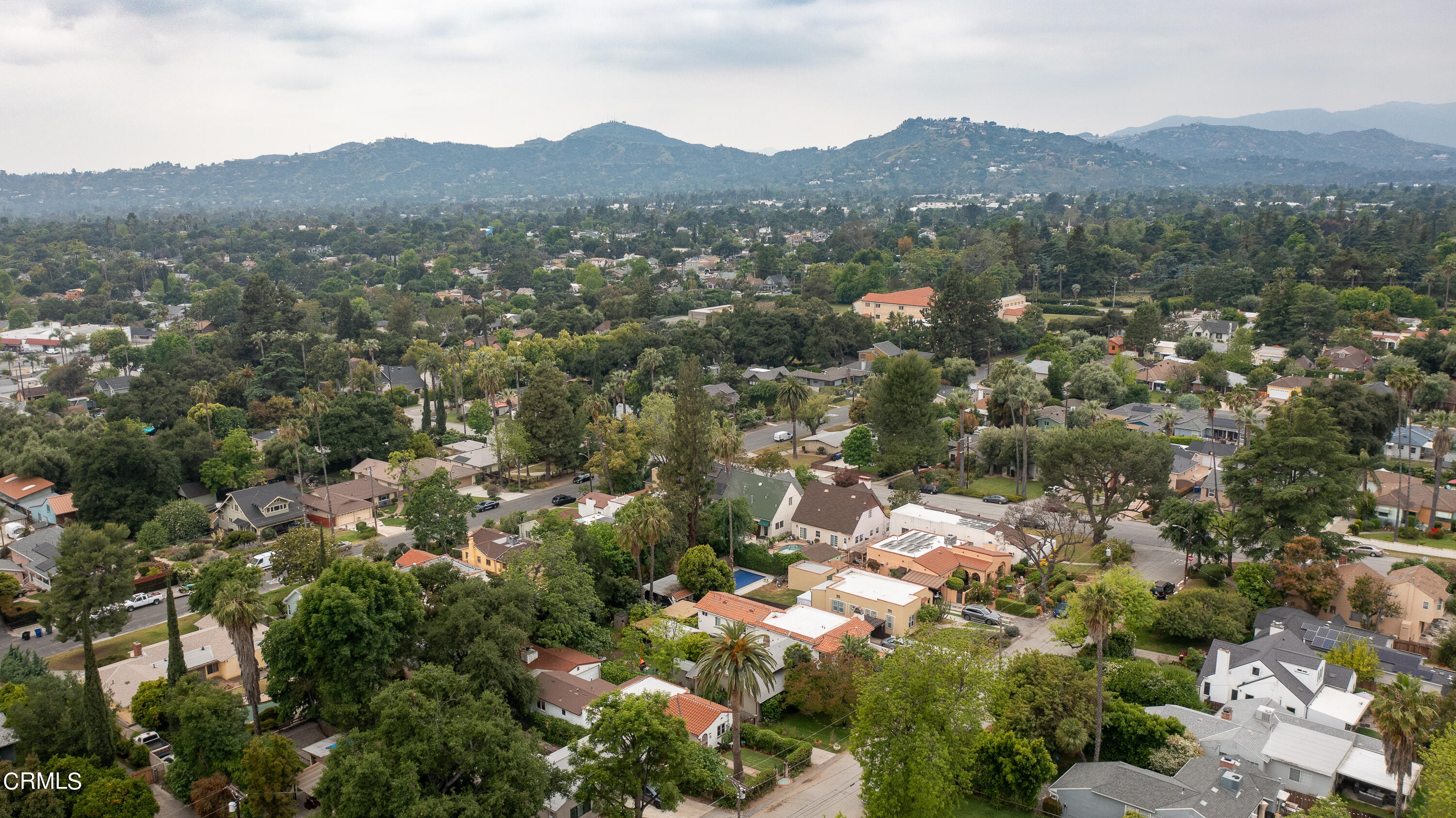 488 Colman Street Altadena, CA 91001 - Photo 56 of 75 a view of a lush green field with mountains in the background