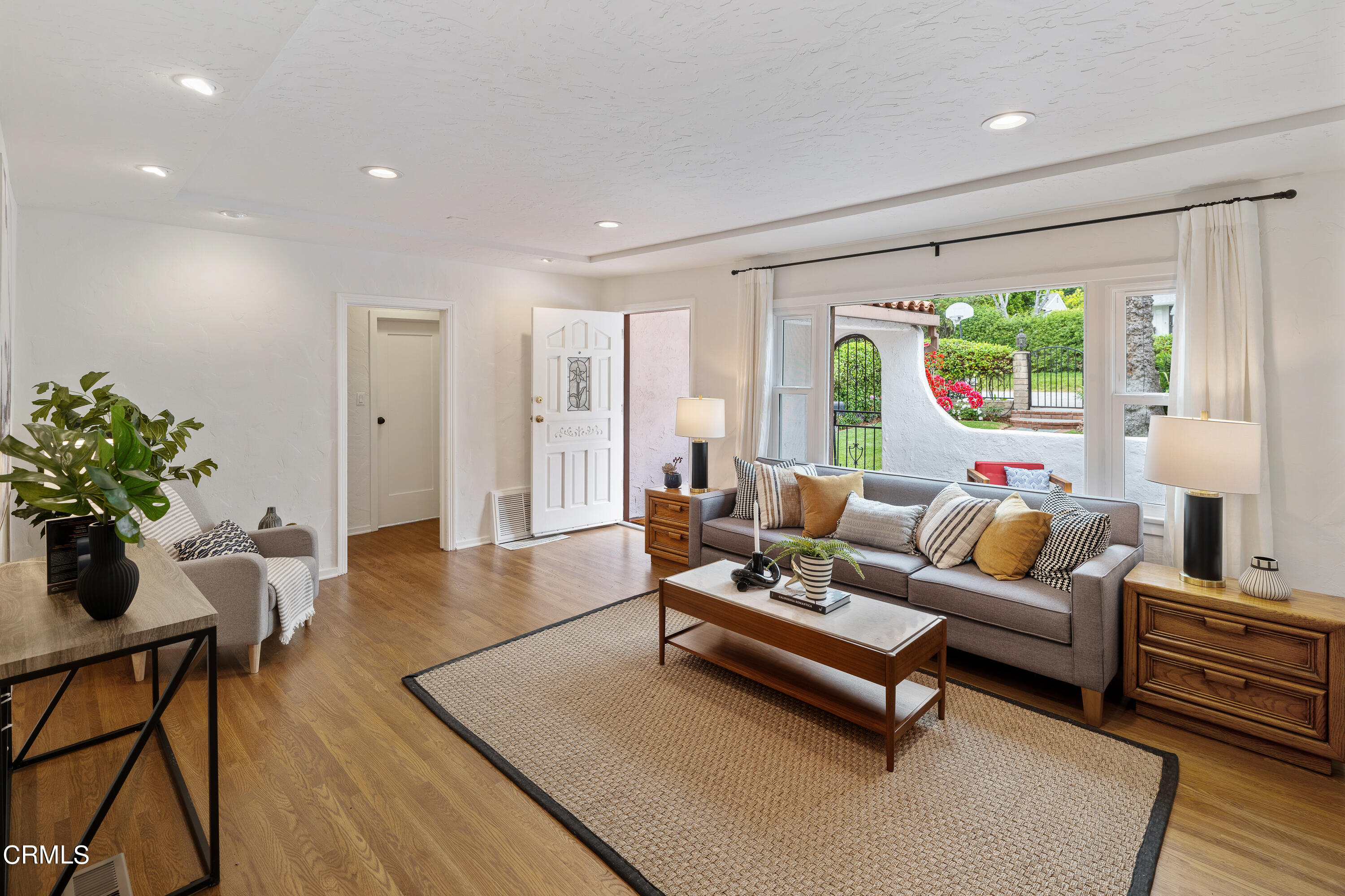488 Colman Street Altadena, CA 91001 - Photo 9 of 75 a living room with furniture and a large window