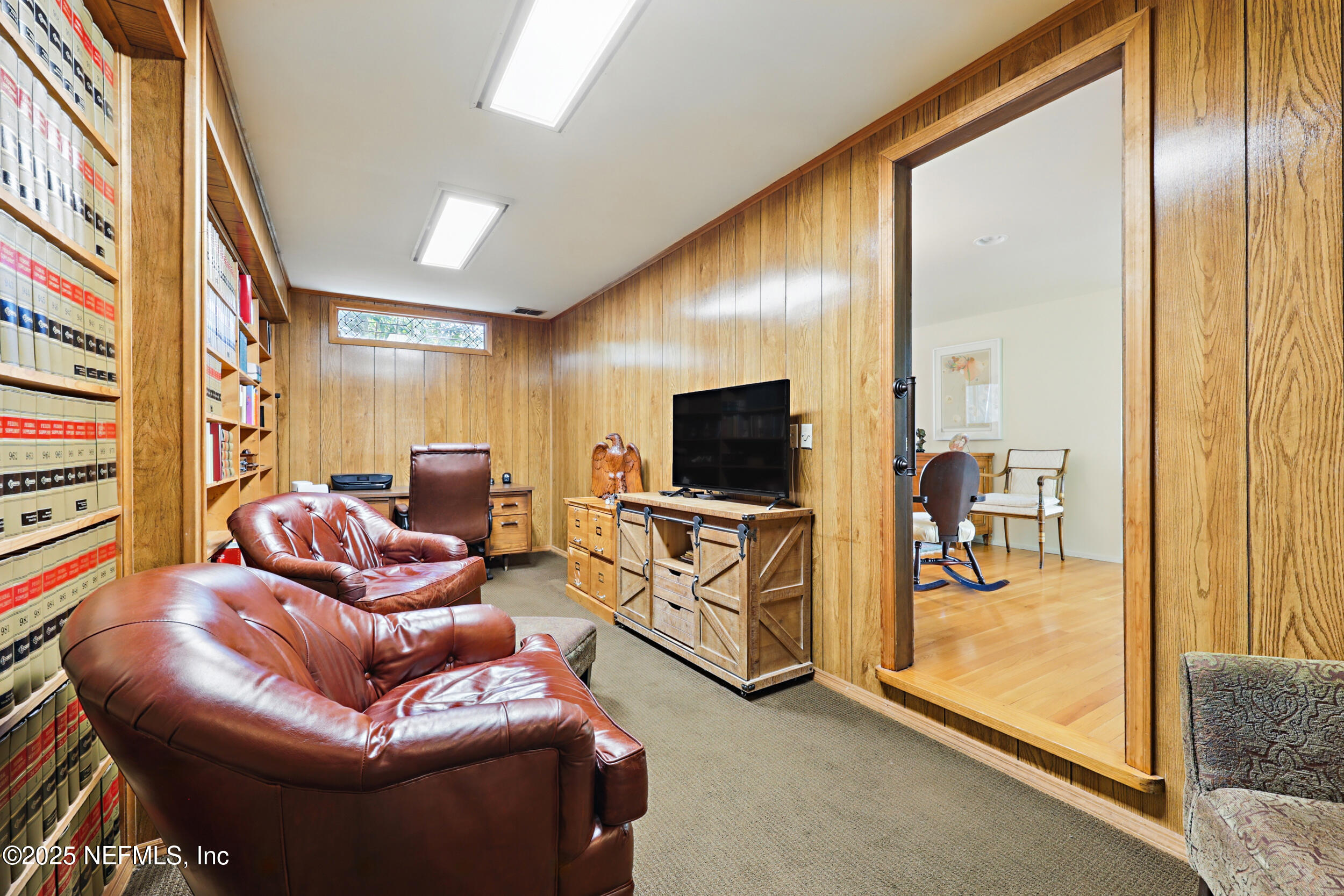 2916 Forest Circle Jacksonville, FL 32257 - Photo 12 of 64 a living room with furniture and a flat screen tv