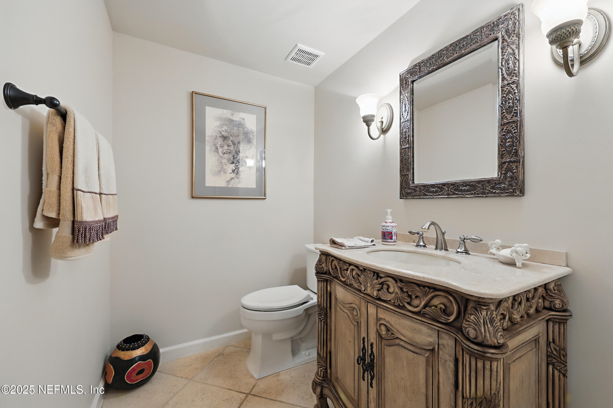 2916 Forest Circle Jacksonville, FL 32257 - Photo 13 of 64 a bathroom with a sink toilet and mirror