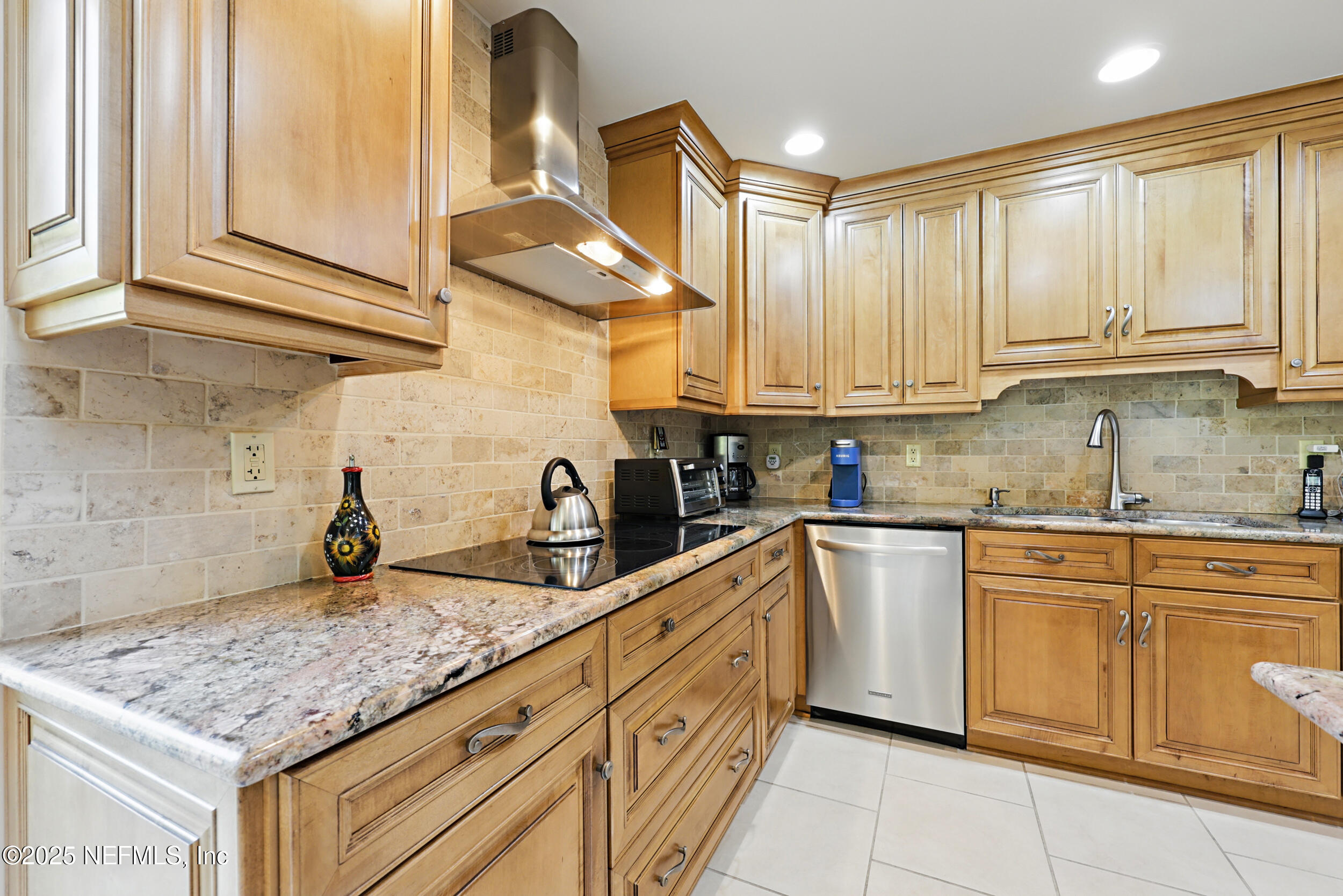 2916 Forest Circle Jacksonville, FL 32257 - Photo 19 of 64 a kitchen with stainless steel appliances granite countertop a sink window and cabinets