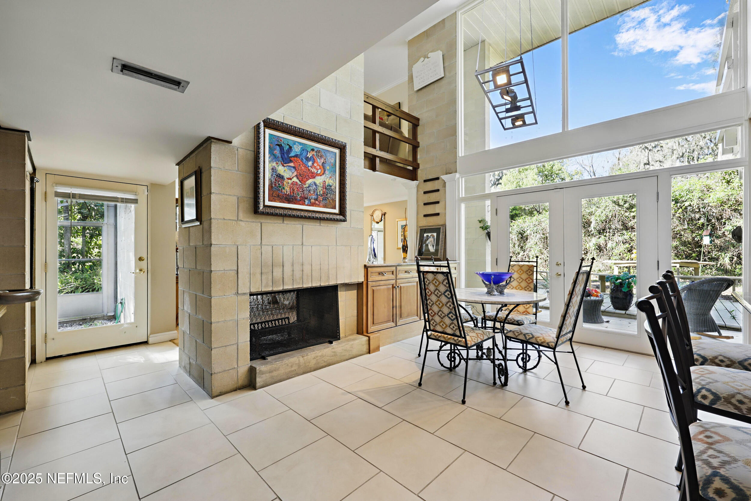 2916 Forest Circle Jacksonville, FL 32257 - Photo 20 of 64 a dining room with furniture and a fireplace
