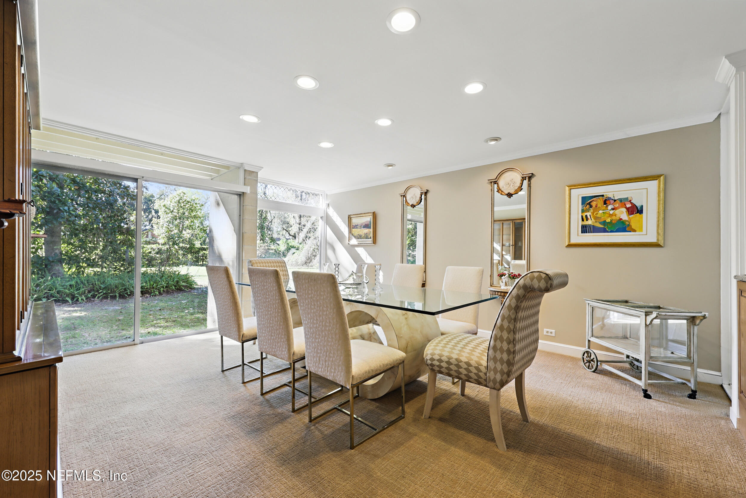 2916 Forest Circle Jacksonville, FL 32257 - Photo 27 of 64 a view of a dining room with furniture window and outside view