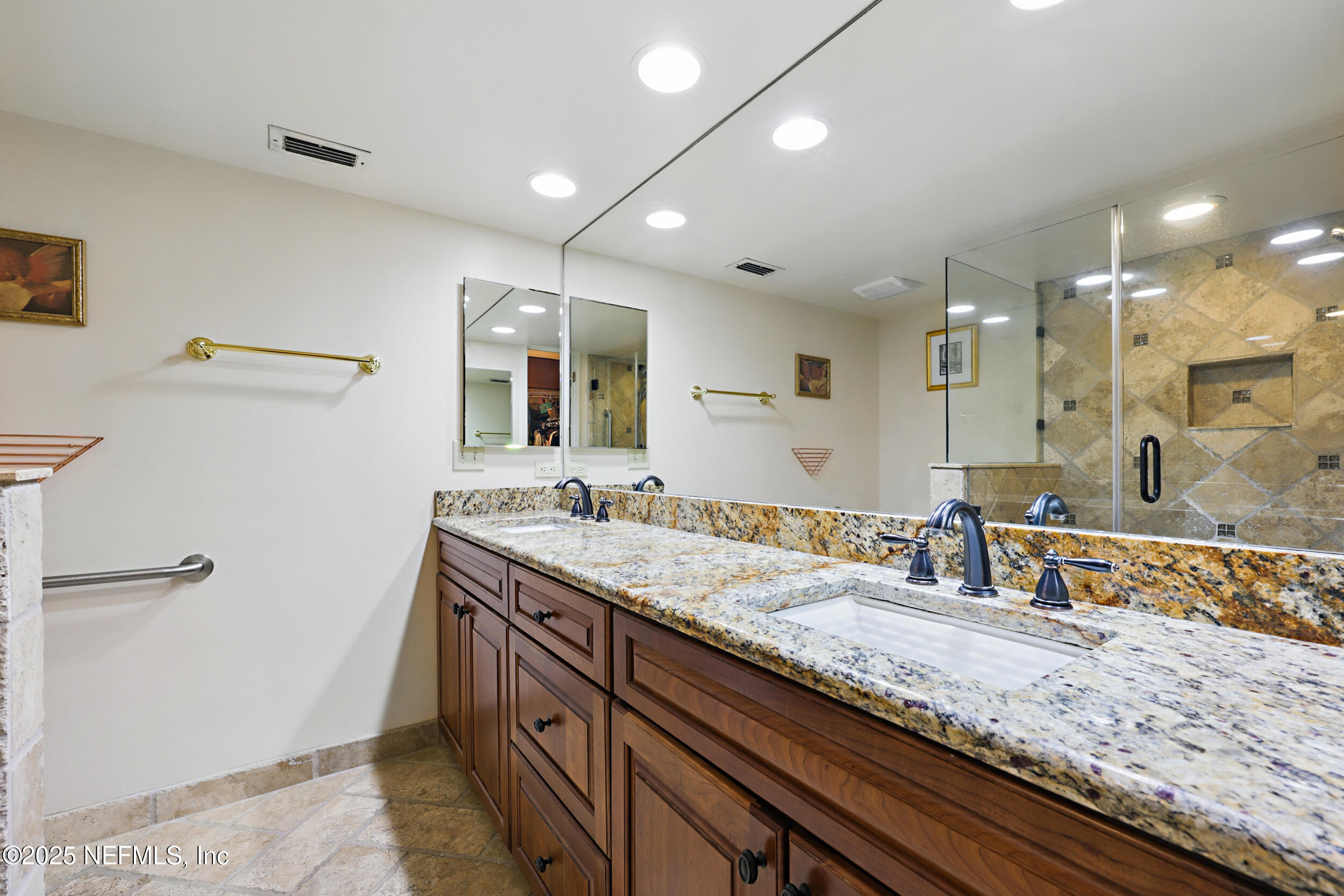 2916 Forest Circle Jacksonville, FL 32257 - Photo 36 of 64 a bathroom with a granite countertop sink and a mirror