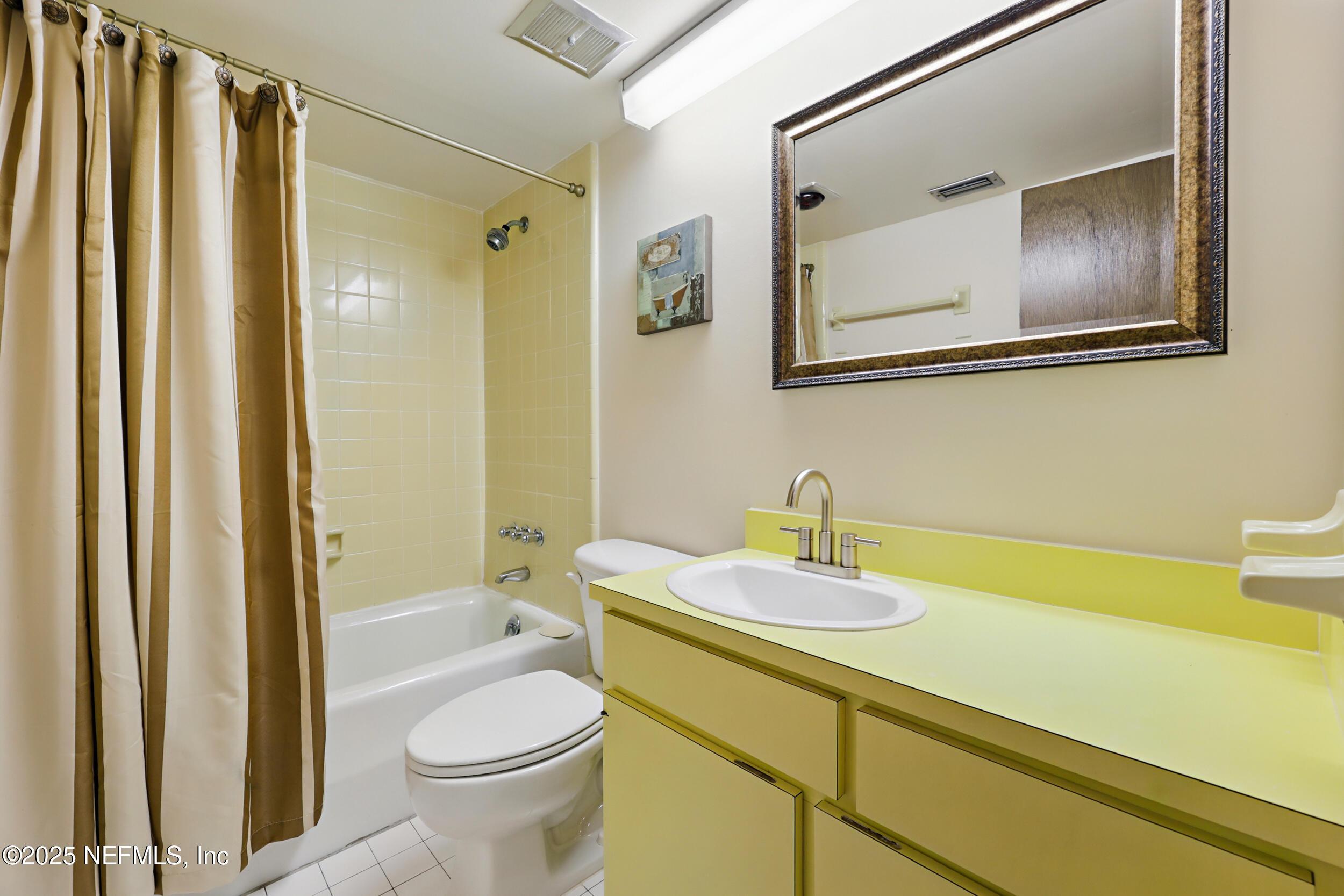 2916 Forest Circle Jacksonville, FL 32257 - Photo 45 of 64 a bathroom with a granite countertop sink toilet and shower