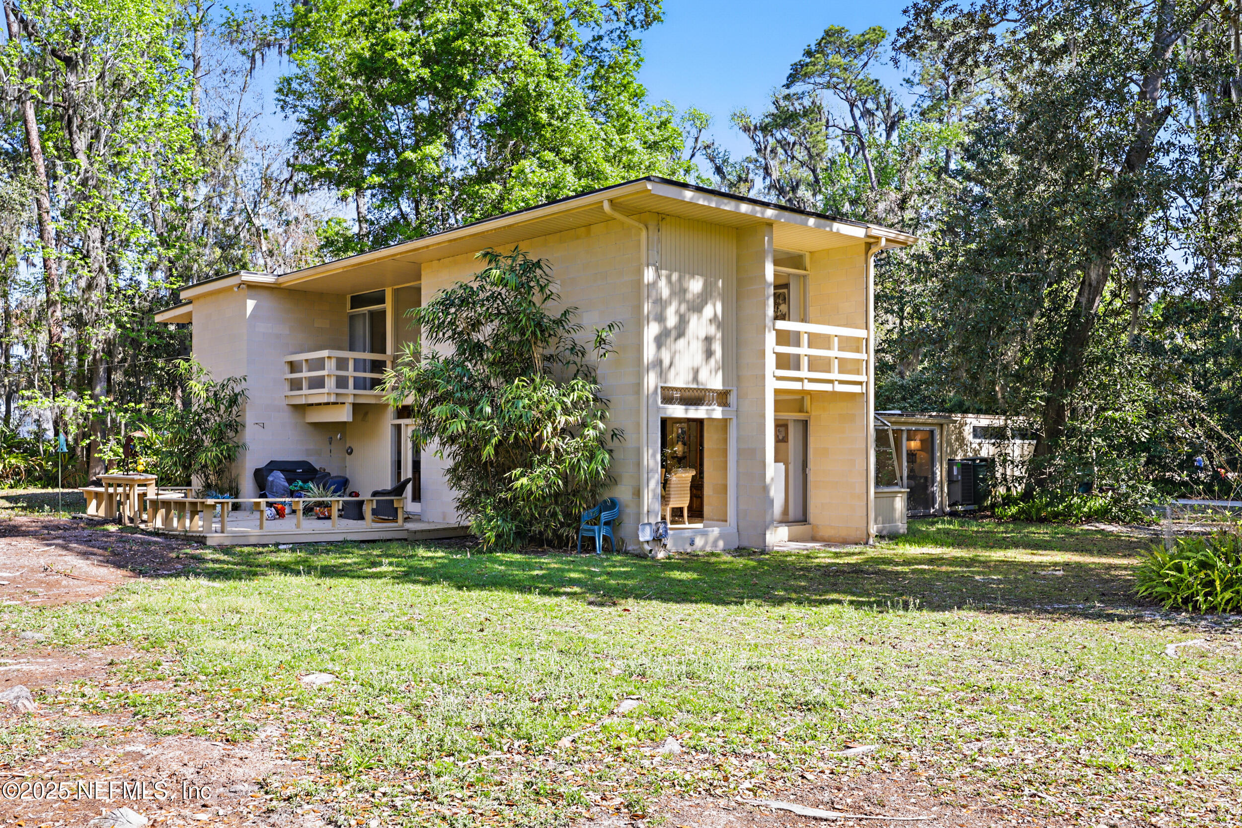 2916 Forest Circle Jacksonville, FL 32257 - Photo 50 of 64 a view of a house with backyard and sitting area