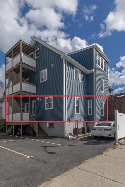 4 Cross Street, Unit 1 Malden, MA 02148 - Photo 16 of 17 a front view of a building with street view