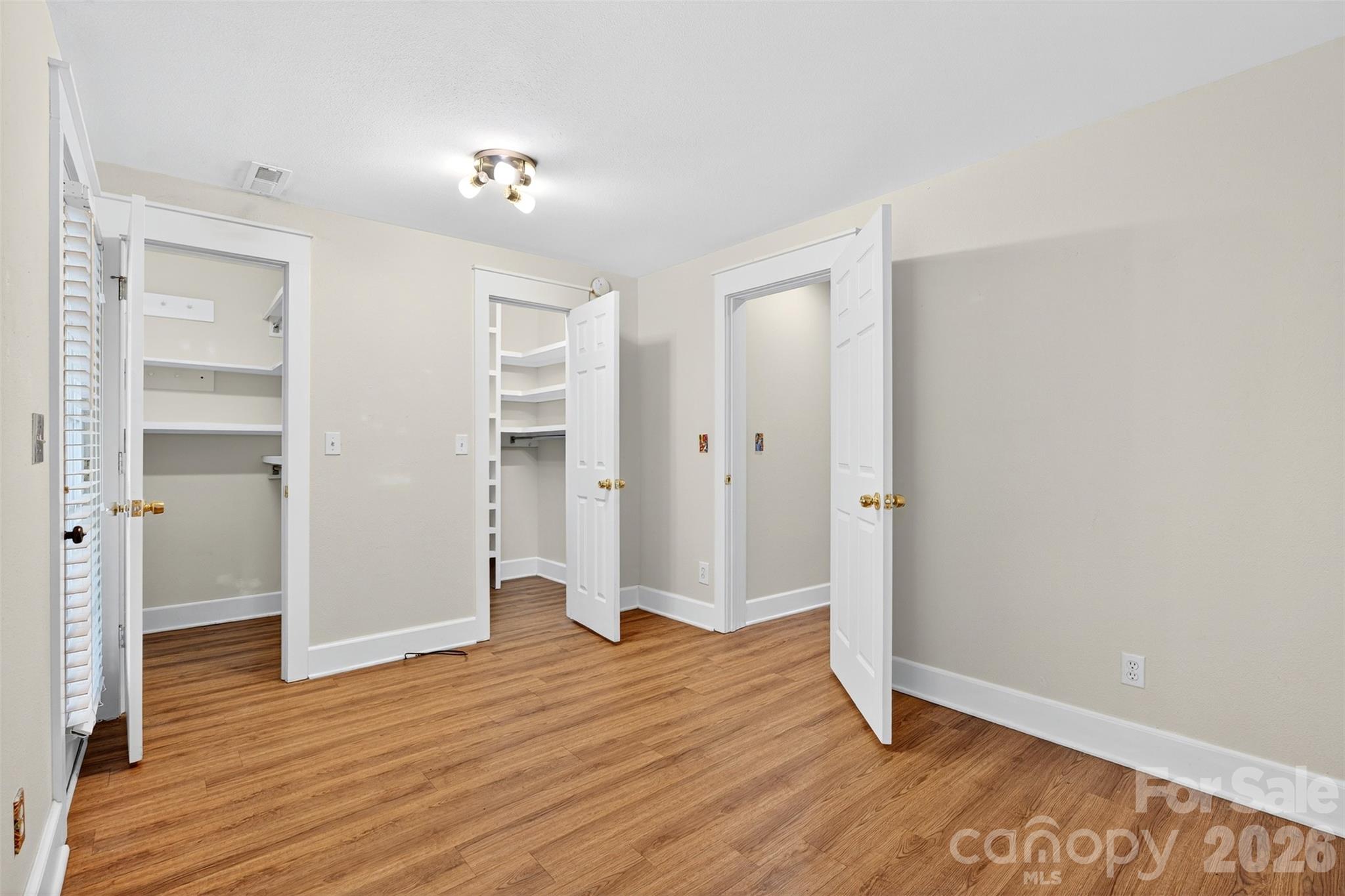160 East Howard Street Tryon, NC 28782 - Photo 32 of 48 a view of an empty room with wooden floor