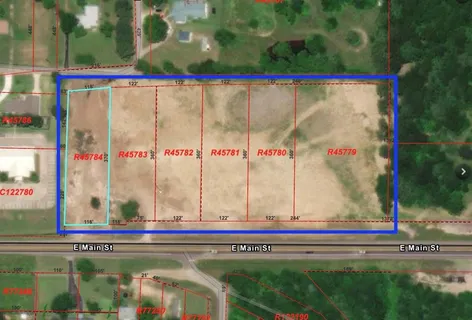 a view of swimming pool with a yard and sitting area