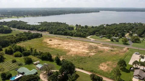a view of a lake from a yard